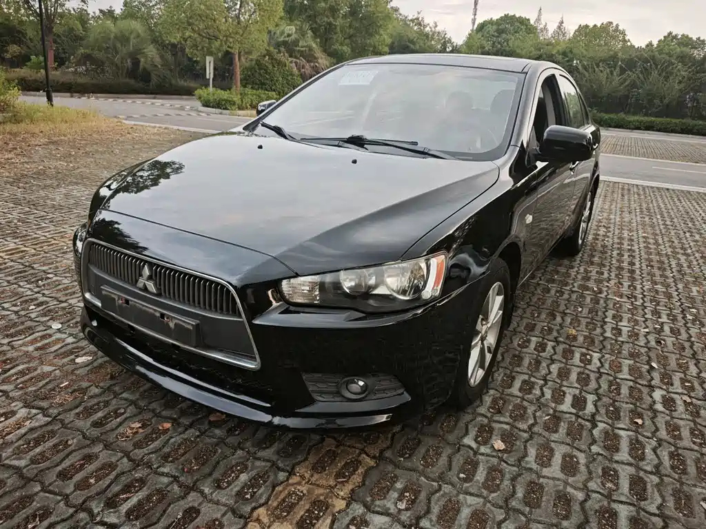 Аукционный лист MITSUBISHI LANCER EX 2013