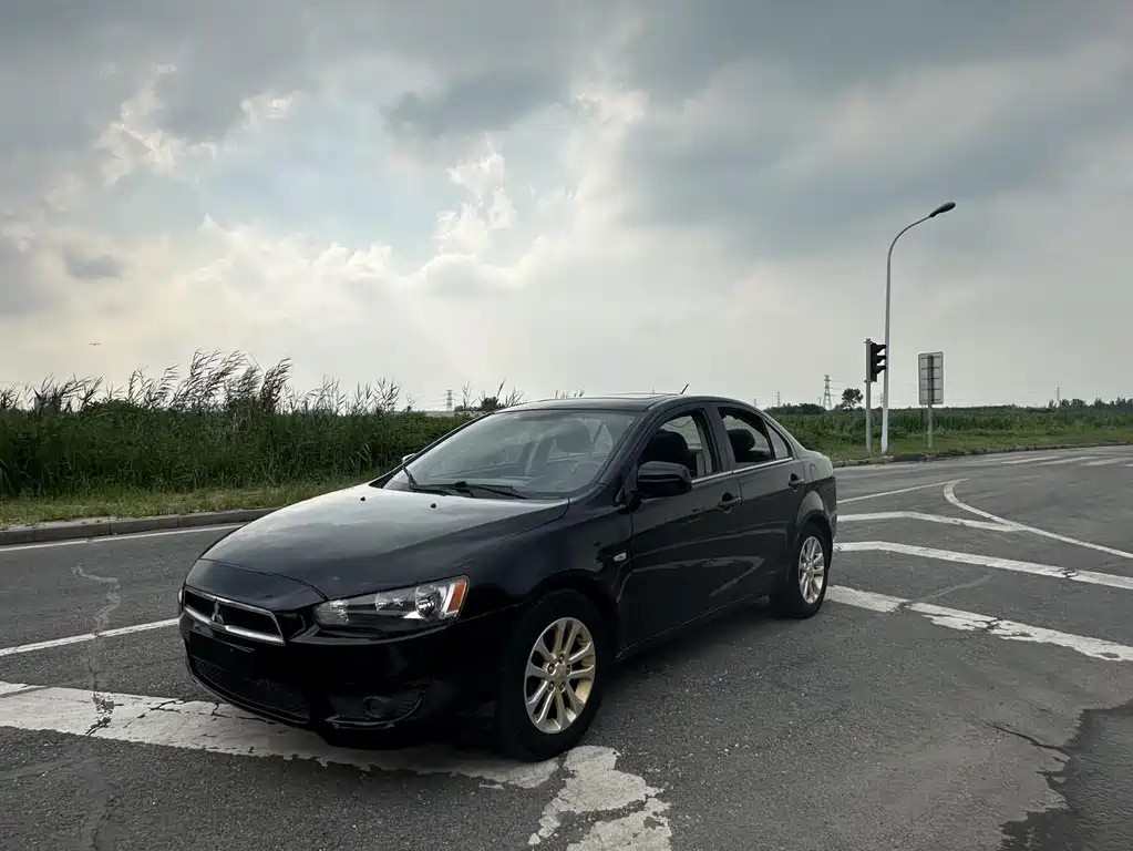 Аукционный лист MITSUBISHI LANCER EX 2013